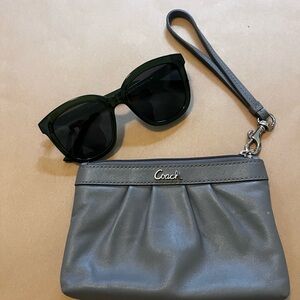 Coach clutch in light grey with pink liner